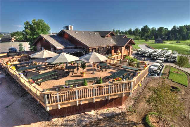 view of the clubhouse and patio at SouthRidge Golf Club